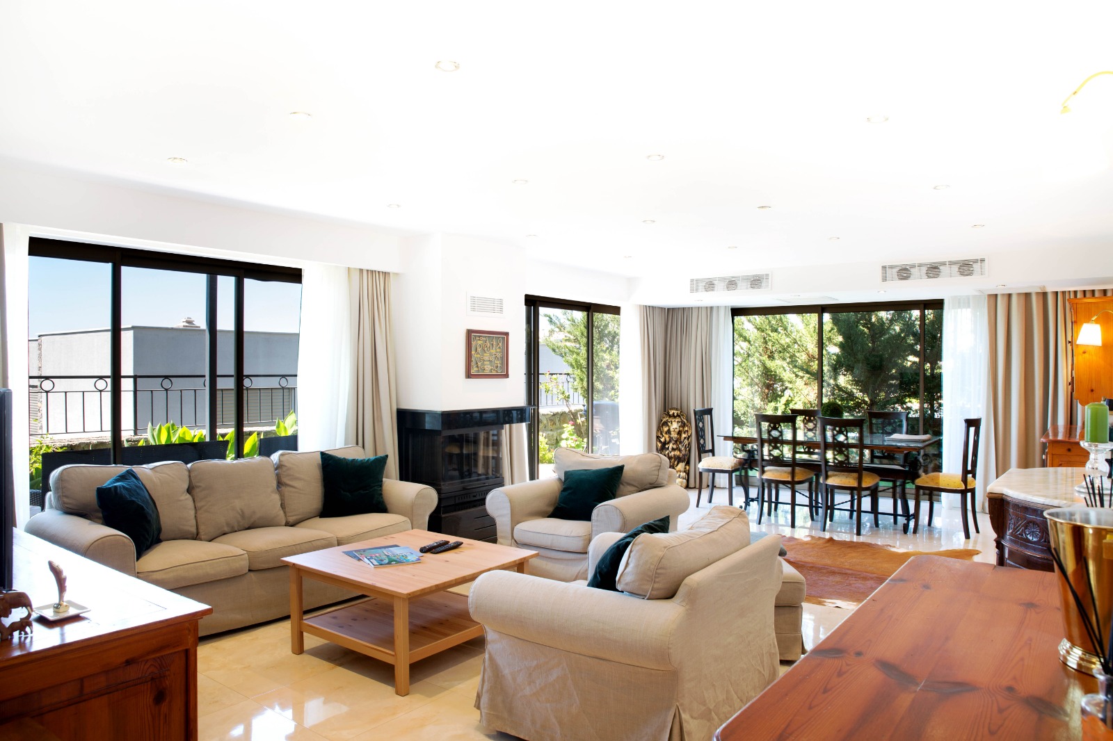 Villa Bavaria — bright open living room with garden views